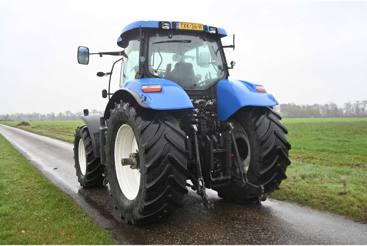 NEW HOLLAND - 2007 - T7030 - ALL-WHEEL DRIVE FARM TRACTOR - Traktor: slika NEW HOLLAND - 2007 - T7030 - ALL-WHEEL DRIVE FARM TRACTOR - Traktor NEW HOLLAND - 2007 - T7030 - ALL-WHEEL DRIVE FARM TRACTOR - Traktor: slika NEW HOLLAND - 2007 - T7030 - ALL-WHEEL DRIVE FARM TRACTOR - Traktor