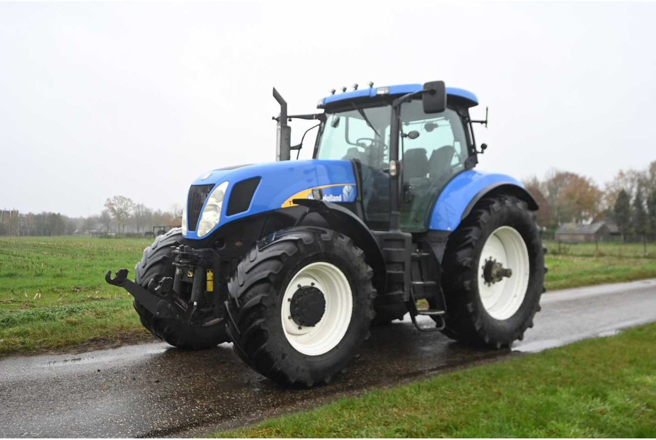 NEW HOLLAND - 2007 - T7030 - ALL-WHEEL DRIVE FARM TRACTOR - Traktor: slika NEW HOLLAND - 2007 - T7030 - ALL-WHEEL DRIVE FARM TRACTOR - Traktor NEW HOLLAND - 2007 - T7030 - ALL-WHEEL DRIVE FARM TRACTOR - Traktor: slika NEW HOLLAND - 2007 - T7030 - ALL-WHEEL DRIVE FARM TRACTOR - Traktor