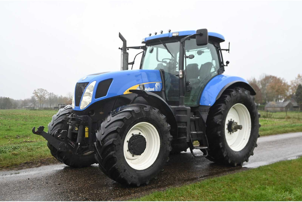 NEW HOLLAND - 2007 - T7030 - ALL-WHEEL DRIVE FARM TRACTOR - Traktor: slika NEW HOLLAND - 2007 - T7030 - ALL-WHEEL DRIVE FARM TRACTOR - Traktor NEW HOLLAND - 2007 - T7030 - ALL-WHEEL DRIVE FARM TRACTOR - Traktor: slika NEW HOLLAND - 2007 - T7030 - ALL-WHEEL DRIVE FARM TRACTOR - Traktor