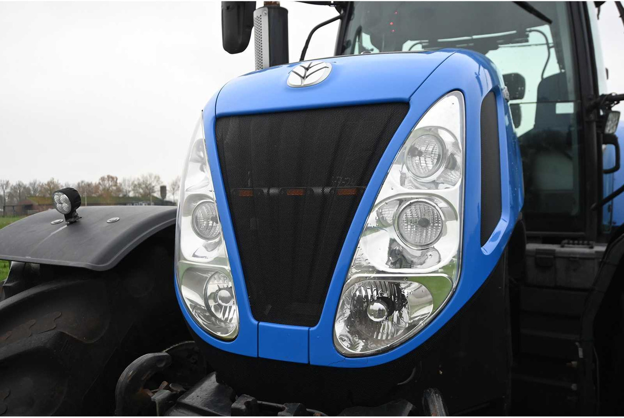 Traktor NEW HOLLAND - 2011 - T7070 - ALL-WHEEL DRIVE FARM TRACTOR: slika Traktor NEW HOLLAND - 2011 - T7070 - ALL-WHEEL DRIVE FARM TRACTOR Traktor NEW HOLLAND - 2011 - T7070 - ALL-WHEEL DRIVE FARM TRACTOR: slika Traktor NEW HOLLAND - 2011 - T7070 - ALL-WHEEL DRIVE FARM TRACTOR