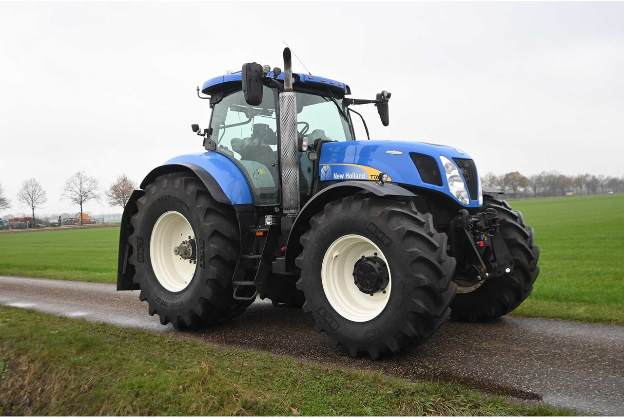 Traktor NEW HOLLAND - 2011 - T7070 - ALL-WHEEL DRIVE FARM TRACTOR: slika Traktor NEW HOLLAND - 2011 - T7070 - ALL-WHEEL DRIVE FARM TRACTOR Traktor NEW HOLLAND - 2011 - T7070 - ALL-WHEEL DRIVE FARM TRACTOR: slika Traktor NEW HOLLAND - 2011 - T7070 - ALL-WHEEL DRIVE FARM TRACTOR