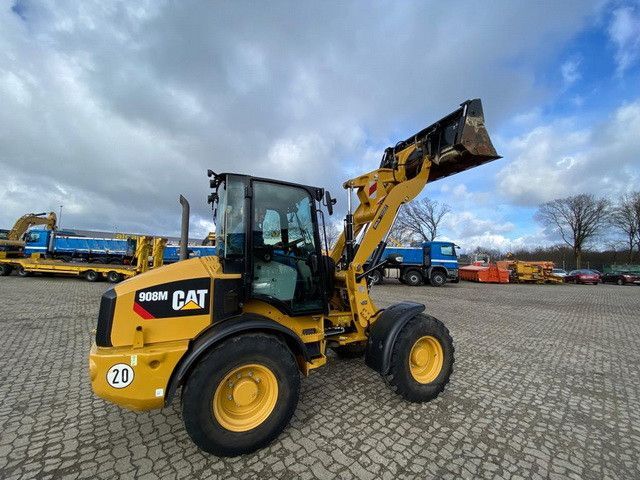 CAT 908M, 4+1 Schaufel, Palettengabel, wenig Std. - Utovarivač na kotačima: slika CAT 908M, 4+1 Schaufel, Palettengabel, wenig Std. - Utovarivač na kotačima CAT 908M, 4+1 Schaufel, Palettengabel, wenig Std. - Utovarivač na kotačima: slika CAT 908M, 4+1 Schaufel, Palettengabel, wenig Std. - Utovarivač na kotačima