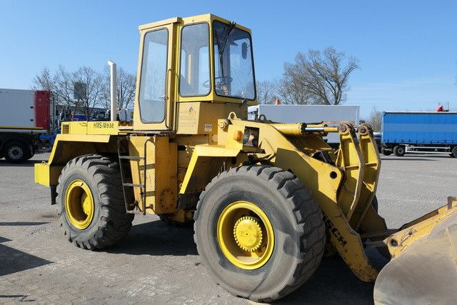 Faun F 1400 C, Deutz-Motor, 2.6m³ Schaufel, Kabine - Utovarivač na kotačima: slika Faun F 1400 C, Deutz-Motor, 2.6m³ Schaufel, Kabine - Utovarivač na kotačima Faun F 1400 C, Deutz-Motor, 2.6m³ Schaufel, Kabine - Utovarivač na kotačima: slika Faun F 1400 C, Deutz-Motor, 2.6m³ Schaufel, Kabine - Utovarivač na kotačima