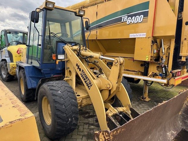Hanomag 15 F, Hyd. S.W.S, Schaufel, BEKA MAX, ZSA - Utovarivač na kotačima: slika Hanomag 15 F, Hyd. S.W.S, Schaufel, BEKA MAX, ZSA - Utovarivač na kotačima Hanomag 15 F, Hyd. S.W.S, Schaufel, BEKA MAX, ZSA - Utovarivač na kotačima: slika Hanomag 15 F, Hyd. S.W.S, Schaufel, BEKA MAX, ZSA - Utovarivač na kotačima