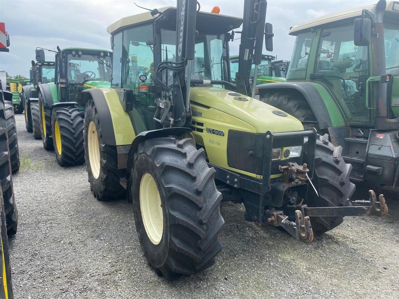 Hürlimann XT 909 - Traktor: slika Hürlimann XT 909 - Traktor Hürlimann XT 909 - Traktor: slika Hürlimann XT 909 - Traktor