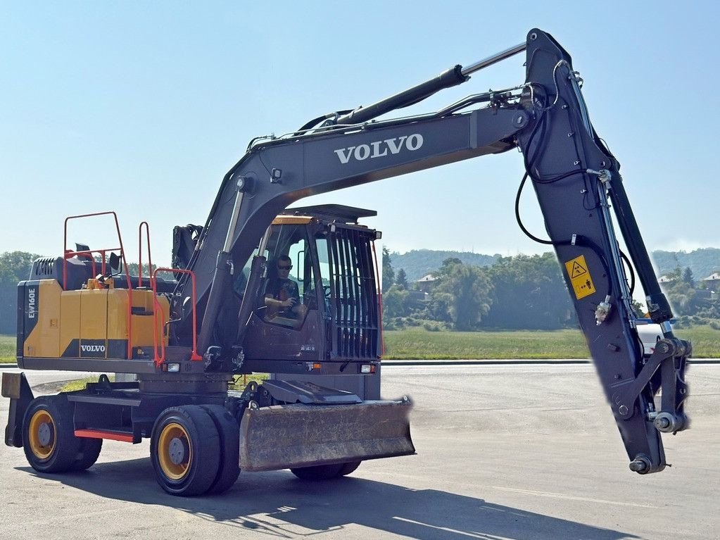 Volvo EW 160 E* Umschlagbagger * TOPZUSTAND - Bager na kotačima: slika Volvo EW 160 E* Umschlagbagger * TOPZUSTAND - Bager na kotačima Volvo EW 160 E* Umschlagbagger * TOPZUSTAND - Bager na kotačima: slika Volvo EW 160 E* Umschlagbagger * TOPZUSTAND - Bager na kotačima
