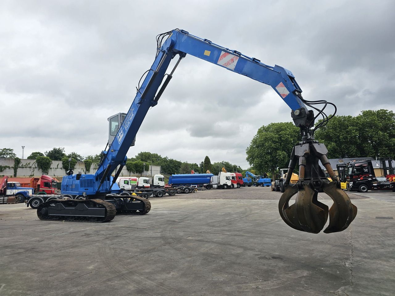 Fuchs RHL 350 Materialhandler With Adjustable Tracks - Stroj za rukovanje otpadom: slika Fuchs RHL 350 Materialhandler With Adjustable Tracks - Stroj za rukovanje otpadom Fuchs RHL 350 Materialhandler With Adjustable Tracks - Stroj za rukovanje otpadom: slika Fuchs RHL 350 Materialhandler With Adjustable Tracks - Stroj za rukovanje otpadom