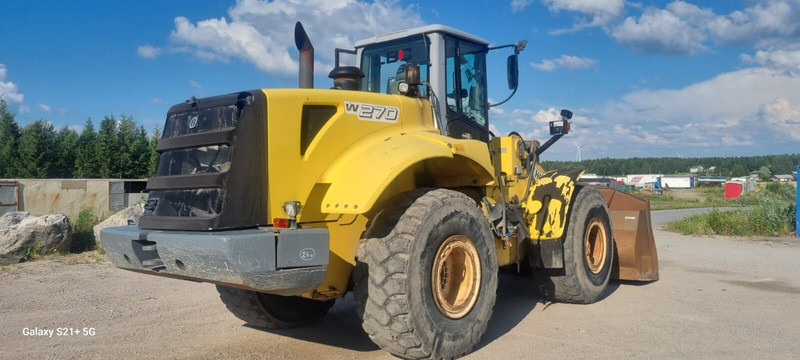 New Holland W270 - Utovarivač na kotačima: slika New Holland W270 - Utovarivač na kotačima New Holland W270 - Utovarivač na kotačima: slika New Holland W270 - Utovarivač na kotačima