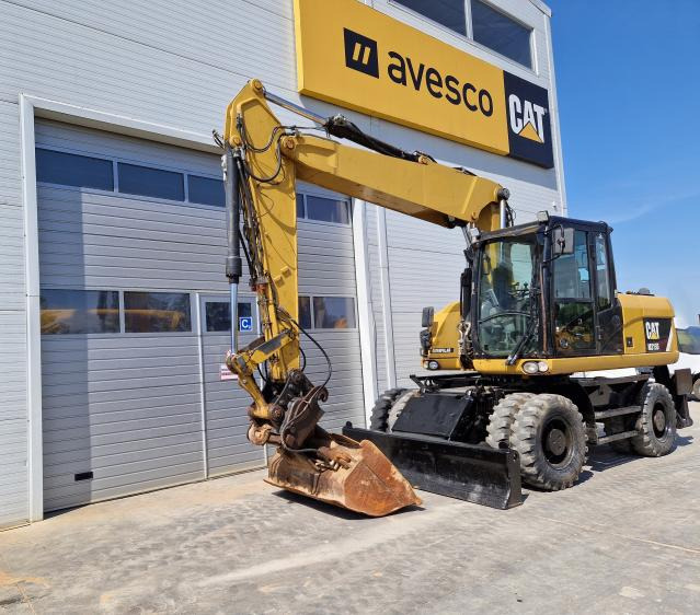 CATERPILLAR M315 - Bager na kotačima: slika CATERPILLAR M315 - Bager na kotačima CATERPILLAR M315 - Bager na kotačima: slika CATERPILLAR M315 - Bager na kotačima