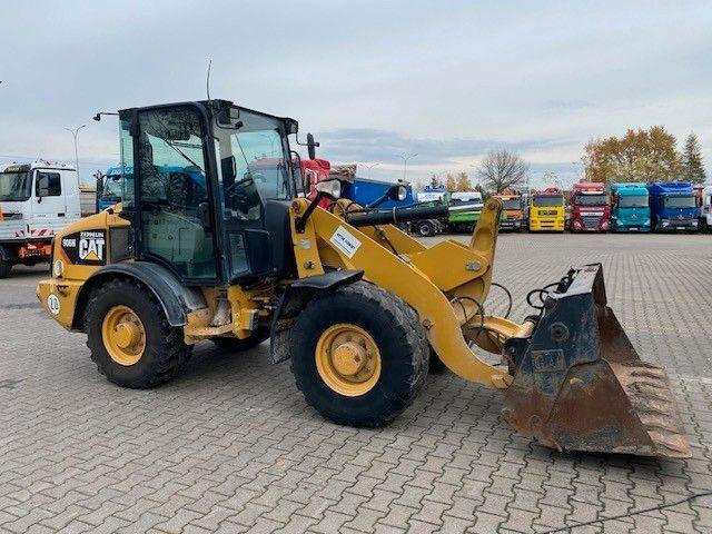 Caterpillar 906H - Utovarivač na kotačima: slika Caterpillar 906H - Utovarivač na kotačima Caterpillar 906H - Utovarivač na kotačima: slika Caterpillar 906H - Utovarivač na kotačima