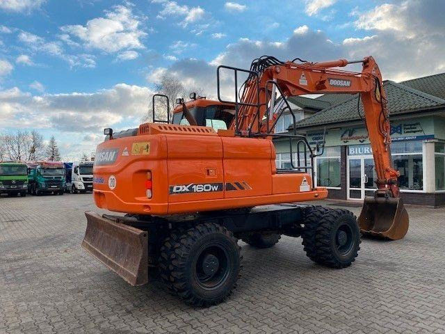 Doosan DX 160 W-3 - Bager na kotačima: slika Doosan DX 160 W-3 - Bager na kotačima Doosan DX 160 W-3 - Bager na kotačima: slika Doosan DX 160 W-3 - Bager na kotačima