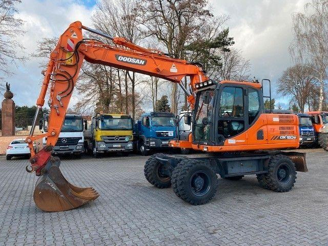 Doosan DX 160 W-3 - Bager na kotačima: slika Doosan DX 160 W-3 - Bager na kotačima Doosan DX 160 W-3 - Bager na kotačima: slika Doosan DX 160 W-3 - Bager na kotačima