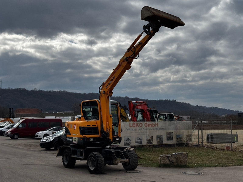 Hyundai Robex 55W-9A - Bager na kotačima: slika Hyundai Robex 55W-9A - Bager na kotačima Hyundai Robex 55W-9A - Bager na kotačima: slika Hyundai Robex 55W-9A - Bager na kotačima