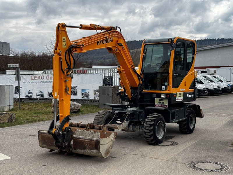 Hyundai Robex 55W-9A - Bager na kotačima: slika Hyundai Robex 55W-9A - Bager na kotačima Hyundai Robex 55W-9A - Bager na kotačima: slika Hyundai Robex 55W-9A - Bager na kotačima