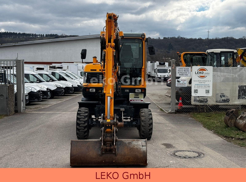 Hyundai Robex 55W-9A Mit Drei Löffeln - Bager na kotačima: slika Hyundai Robex 55W-9A Mit Drei Löffeln - Bager na kotačima Hyundai Robex 55W-9A Mit Drei Löffeln - Bager na kotačima: slika Hyundai Robex 55W-9A Mit Drei Löffeln - Bager na kotačima