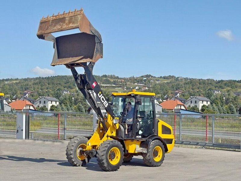 JCB 406 t4 * RADLADER * 4x4 * TOPZUSTAND - Utovarivač na kotačima: slika JCB 406 t4 * RADLADER * 4x4 * TOPZUSTAND - Utovarivač na kotačima JCB 406 t4 * RADLADER * 4x4 * TOPZUSTAND - Utovarivač na kotačima: slika JCB 406 t4 * RADLADER * 4x4 * TOPZUSTAND - Utovarivač na kotačima