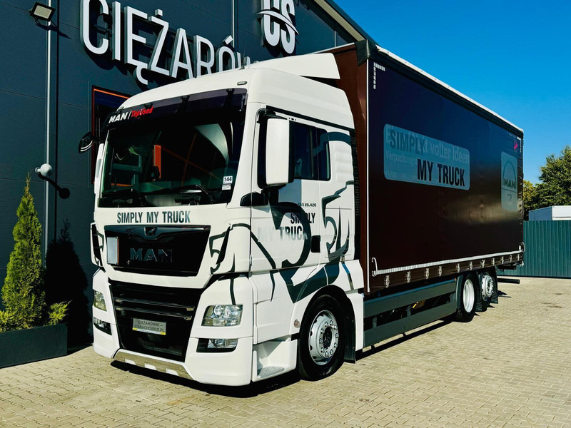 MAN TGX 26.420 - Kamion s ceradom: slika MAN TGX 26.420 - Kamion s ceradom MAN TGX 26.420 - Kamion s ceradom: slika MAN TGX 26.420 - Kamion s ceradom