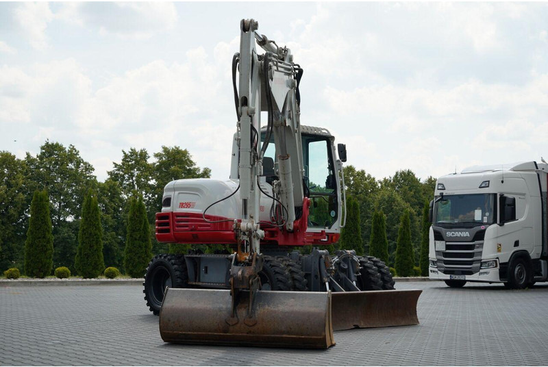 Takeuchi TB 295 W / KOPARKA KOŁOWA / 2016 ROK / PO KONTRAKCIE SERWISOWYM - Bager na kotačima: slika Takeuchi TB 295 W / KOPARKA KOŁOWA / 2016 ROK / PO KONTRAKCIE SERWISOWYM - Bager na kotačima Takeuchi TB 295 W / KOPARKA KOŁOWA / 2016 ROK / PO KONTRAKCIE SERWISOWYM - Bager na kotačima: slika Takeuchi TB 295 W / KOPARKA KOŁOWA / 2016 ROK / PO KONTRAKCIE SERWISOWYM - Bager na kotačima
