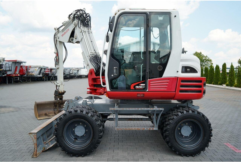 Takeuchi TB 295 W / KOPARKA KOŁOWA / 2016 ROK / PO KONTRAKCIE SERWISOWYM - Bager na kotačima: slika Takeuchi TB 295 W / KOPARKA KOŁOWA / 2016 ROK / PO KONTRAKCIE SERWISOWYM - Bager na kotačima Takeuchi TB 295 W / KOPARKA KOŁOWA / 2016 ROK / PO KONTRAKCIE SERWISOWYM - Bager na kotačima: slika Takeuchi TB 295 W / KOPARKA KOŁOWA / 2016 ROK / PO KONTRAKCIE SERWISOWYM - Bager na kotačima