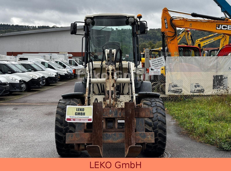 Terex TL 100 - Utovarivač na kotačima: slika Terex TL 100 - Utovarivač na kotačima Terex TL 100 - Utovarivač na kotačima: slika Terex TL 100 - Utovarivač na kotačima