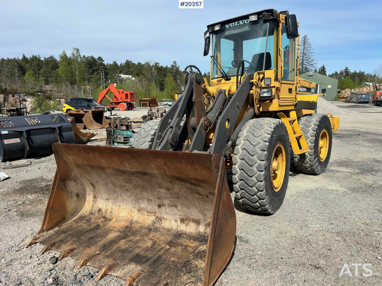 Volvo L70C - Utovarivač na kotačima: slika Volvo L70C - Utovarivač na kotačima Volvo L70C - Utovarivač na kotačima: slika Volvo L70C - Utovarivač na kotačima