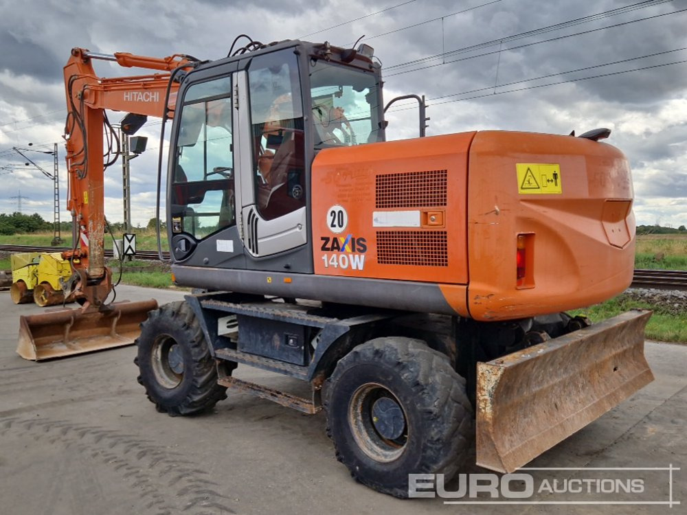 2010 Hitachi ZX140W-3 - Bager na kotačima: slika 2010 Hitachi ZX140W-3 - Bager na kotačima 2010 Hitachi ZX140W-3 - Bager na kotačima: slika 2010 Hitachi ZX140W-3 - Bager na kotačima