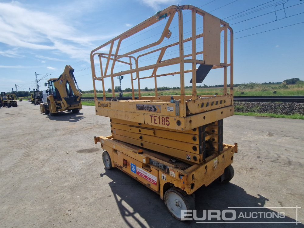 2012 Haulotte Compact 12 - Podizna platforma: slika 2012 Haulotte Compact 12 - Podizna platforma 2012 Haulotte Compact 12 - Podizna platforma: slika 2012 Haulotte Compact 12 - Podizna platforma