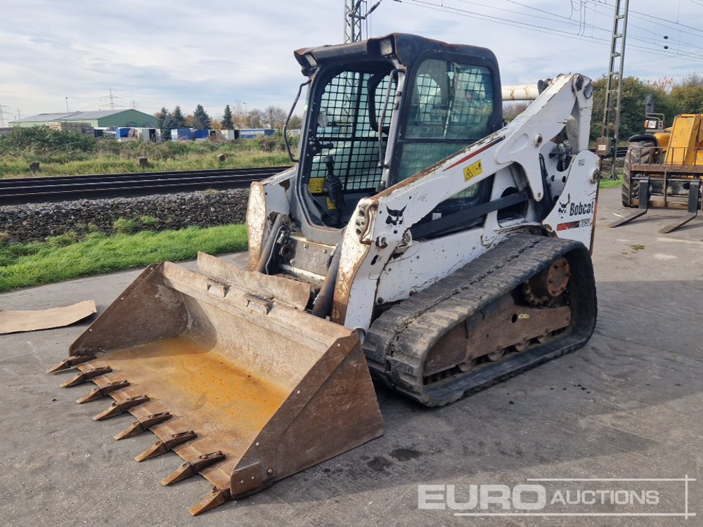 2014 Bobcat T650 - Mini utovarivač: slika 2014 Bobcat T650 - Mini utovarivač 2014 Bobcat T650 - Mini utovarivač: slika 2014 Bobcat T650 - Mini utovarivač