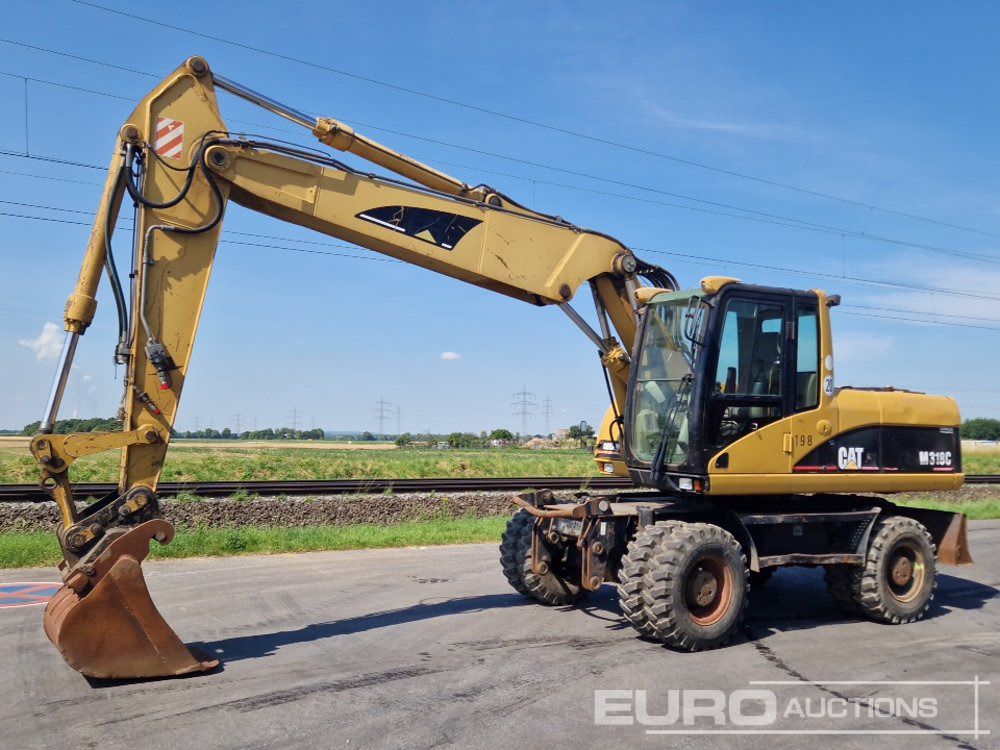 CAT 318C - Bager gusjeničar: slika CAT 318C - Bager gusjeničar CAT 318C - Bager gusjeničar: slika CAT 318C - Bager gusjeničar