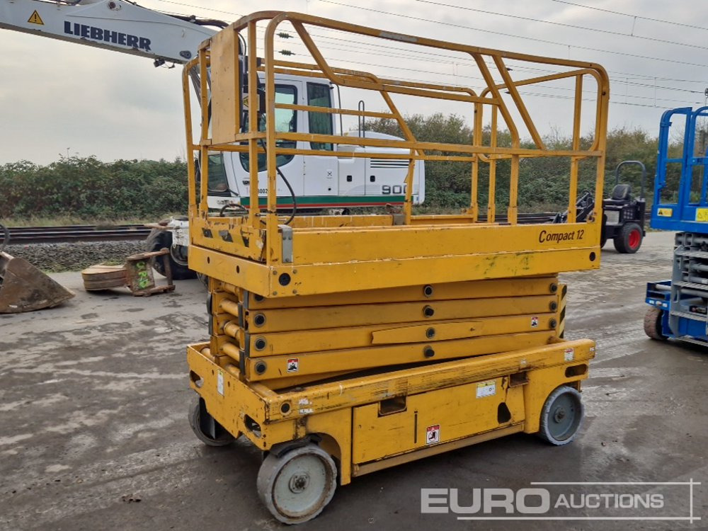 Haulotte Compact 12 - Podizna platforma: slika Haulotte Compact 12 - Podizna platforma Haulotte Compact 12 - Podizna platforma: slika Haulotte Compact 12 - Podizna platforma