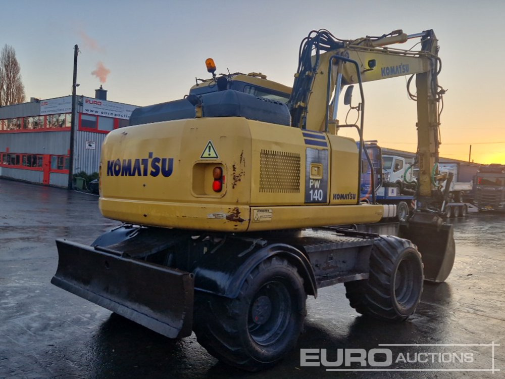 Komatsu PW140-7 - Bager na kotačima: slika Komatsu PW140-7 - Bager na kotačima Komatsu PW140-7 - Bager na kotačima: slika Komatsu PW140-7 - Bager na kotačima