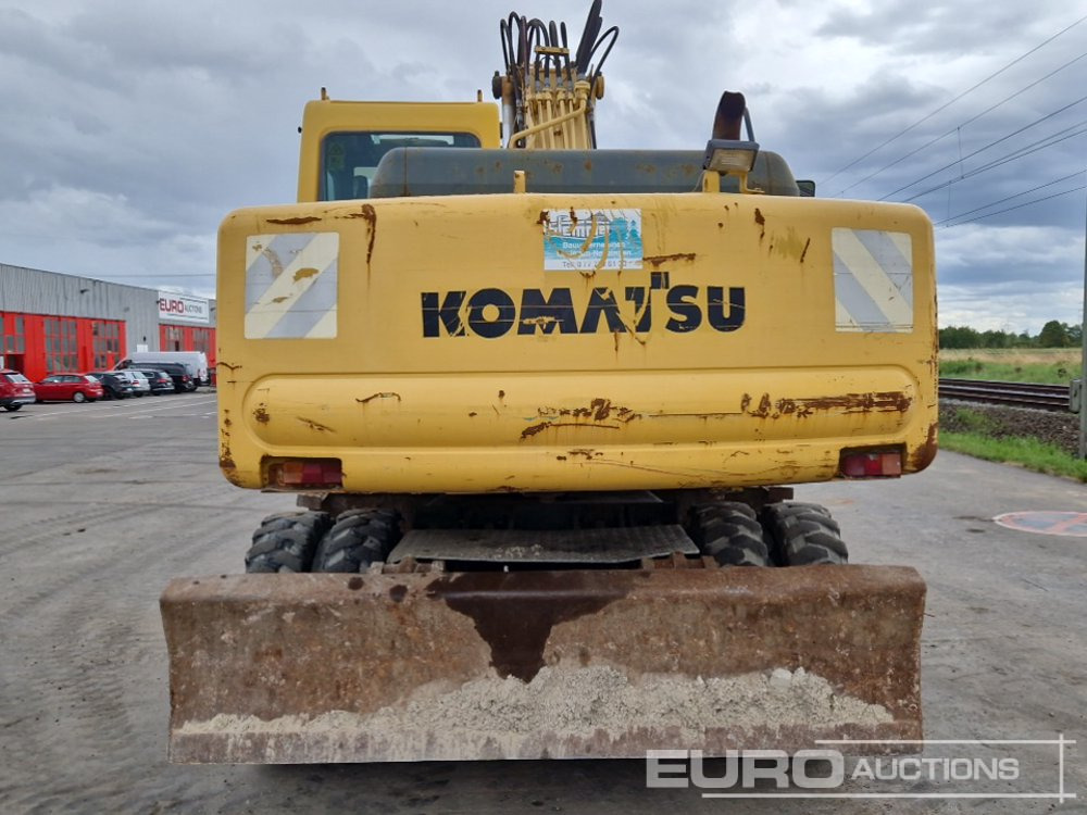 Komatsu PW170ES-6K - Bager na kotačima: slika Komatsu PW170ES-6K - Bager na kotačima Komatsu PW170ES-6K - Bager na kotačima: slika Komatsu PW170ES-6K - Bager na kotačima