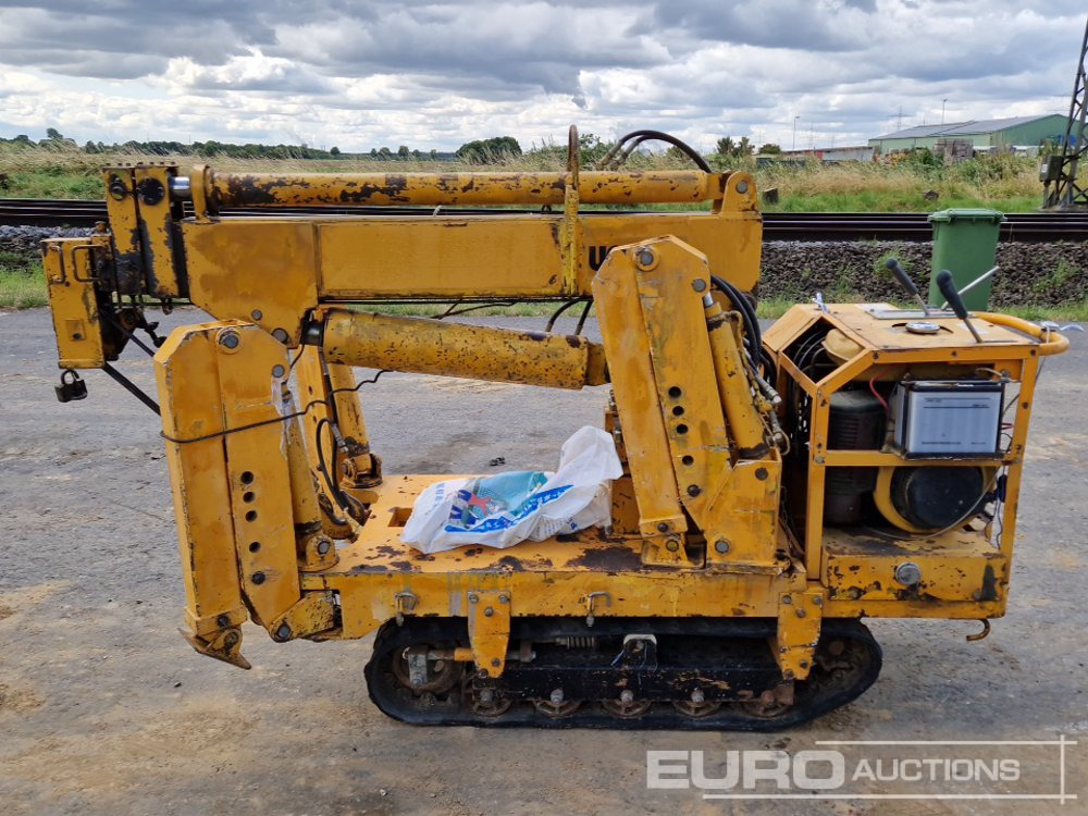 Unikon SKU-701-23 - Dizalica gusjeničar: slika Unikon SKU-701-23 - Dizalica gusjeničar Unikon SKU-701-23 - Dizalica gusjeničar: slika Unikon SKU-701-23 - Dizalica gusjeničar
