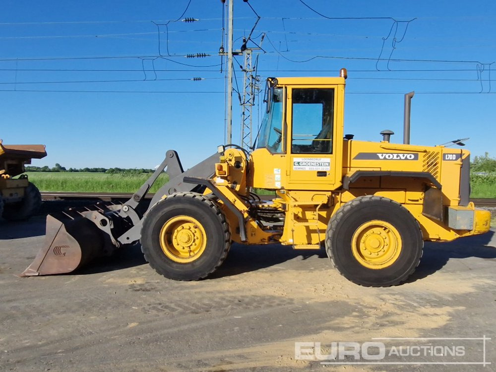 Volvo L70D - Utovarivač na kotačima: slika Volvo L70D - Utovarivač na kotačima Volvo L70D - Utovarivač na kotačima: slika Volvo L70D - Utovarivač na kotačima