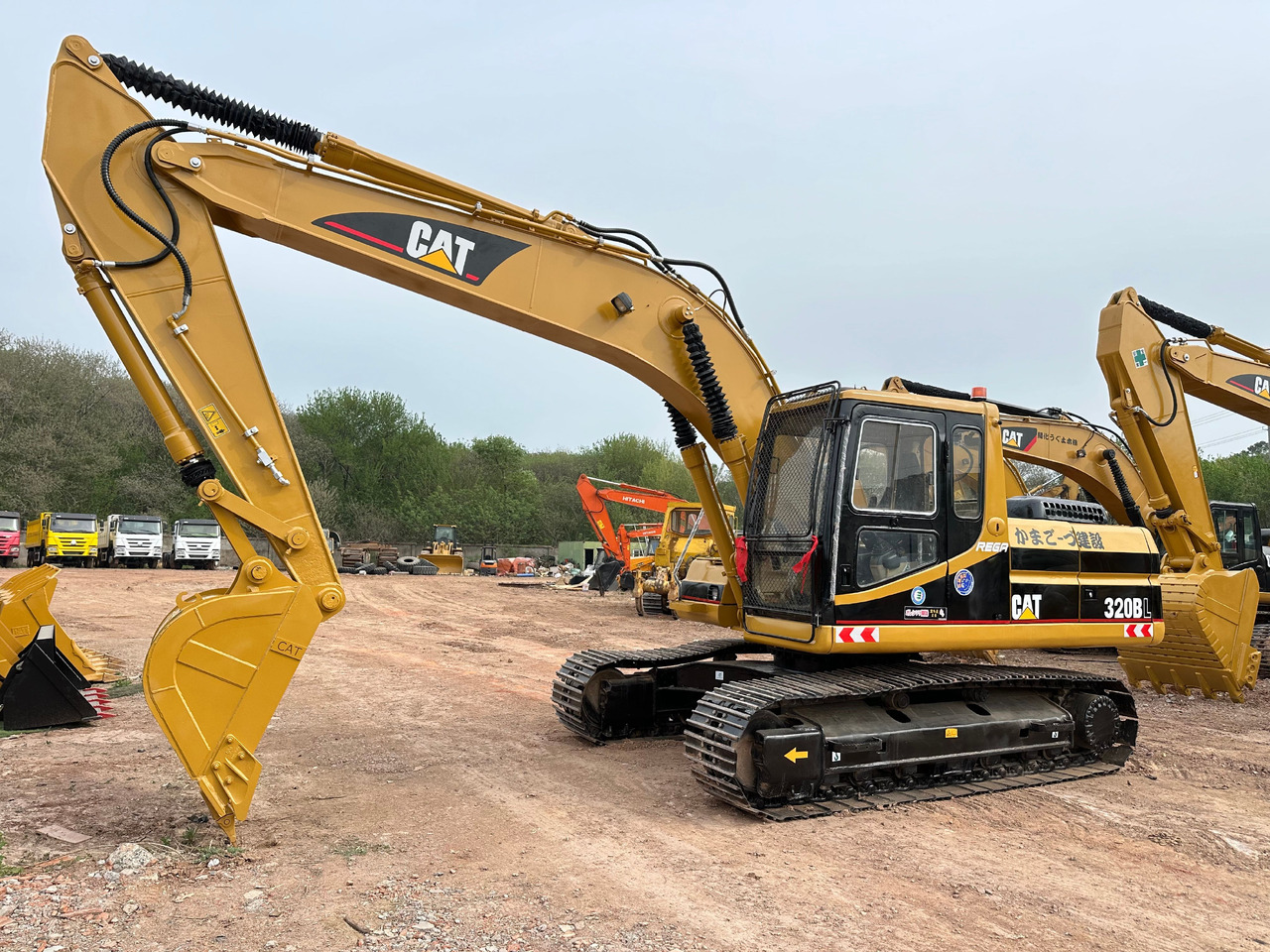 CAT 320BL crawler excavator - Bager gusjeničar: slika CAT 320BL crawler excavator - Bager gusjeničar CAT 320BL crawler excavator - Bager gusjeničar: slika CAT 320BL crawler excavator - Bager gusjeničar