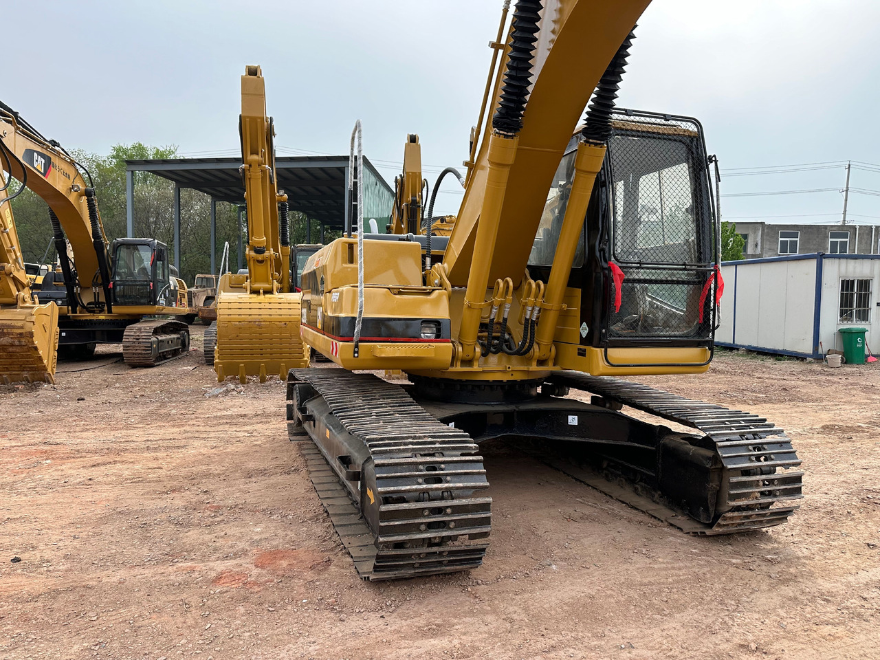 CAT 320BL crawler excavator - Bager gusjeničar: slika CAT 320BL crawler excavator - Bager gusjeničar CAT 320BL crawler excavator - Bager gusjeničar: slika CAT 320BL crawler excavator - Bager gusjeničar