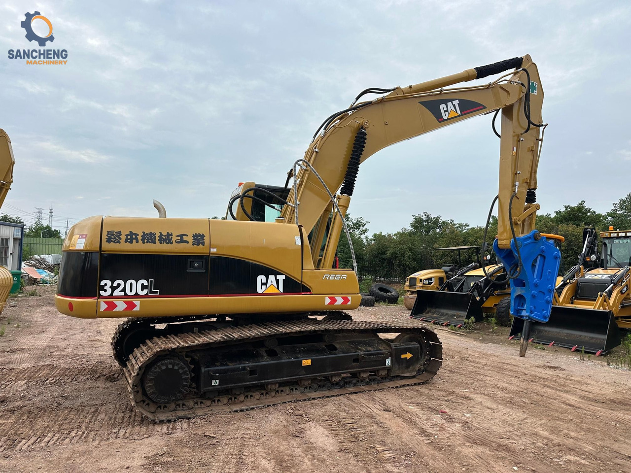 CAT 320CL with hammer - Bager gusjeničar: slika CAT 320CL with hammer - Bager gusjeničar CAT 320CL with hammer - Bager gusjeničar: slika CAT 320CL with hammer - Bager gusjeničar