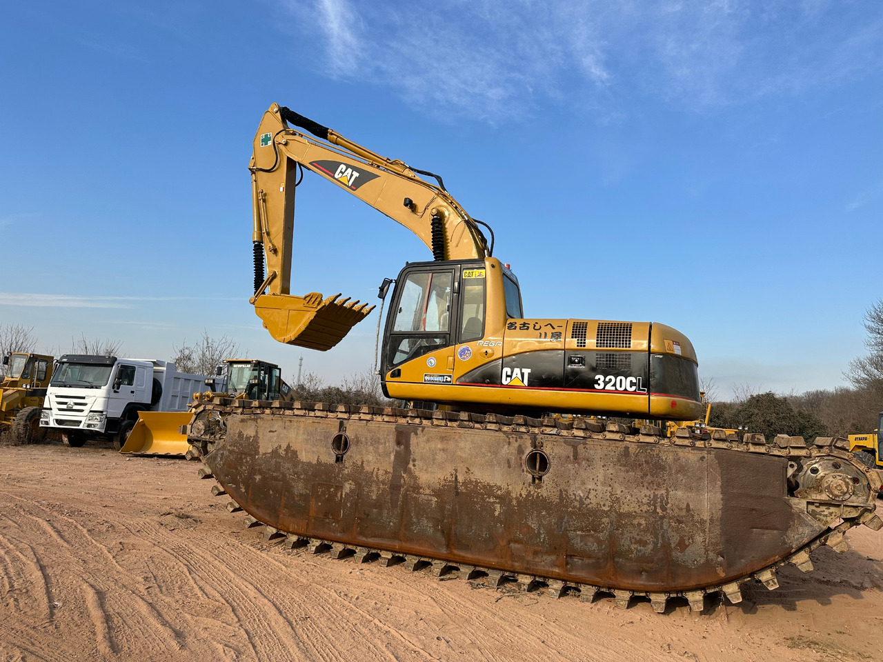 CATERPILLAR 320CL - Bager amfibija: slika CATERPILLAR 320CL - Bager amfibija CATERPILLAR 320CL - Bager amfibija: slika CATERPILLAR 320CL - Bager amfibija