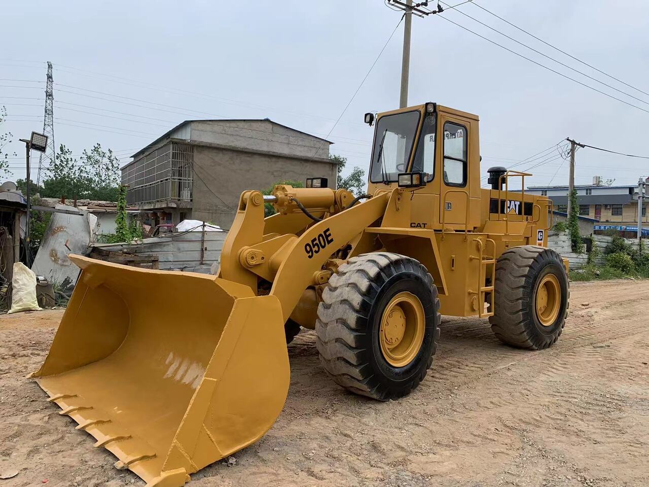 CATERPILLAR 950E - Utovarivač na kotačima: slika CATERPILLAR 950E - Utovarivač na kotačima CATERPILLAR 950E - Utovarivač na kotačima: slika CATERPILLAR 950E - Utovarivač na kotačima