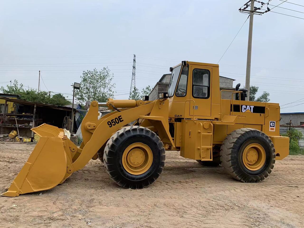 CATERPILLAR 950E - Utovarivač na kotačima: slika CATERPILLAR 950E - Utovarivač na kotačima CATERPILLAR 950E - Utovarivač na kotačima: slika CATERPILLAR 950E - Utovarivač na kotačima