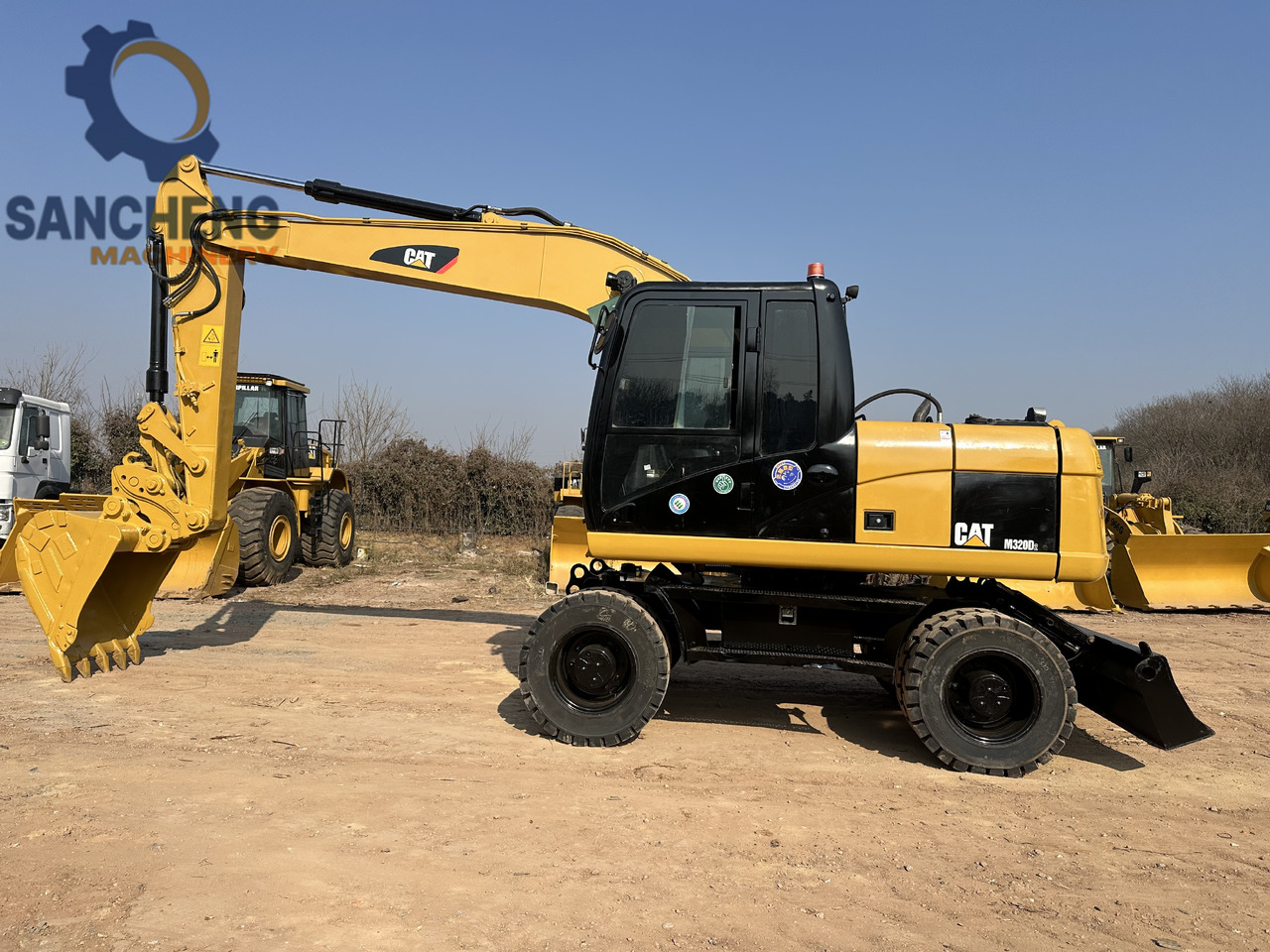 CATERPILLAR M320D2 - Bager na kotačima: slika CATERPILLAR M320D2 - Bager na kotačima CATERPILLAR M320D2 - Bager na kotačima: slika CATERPILLAR M320D2 - Bager na kotačima
