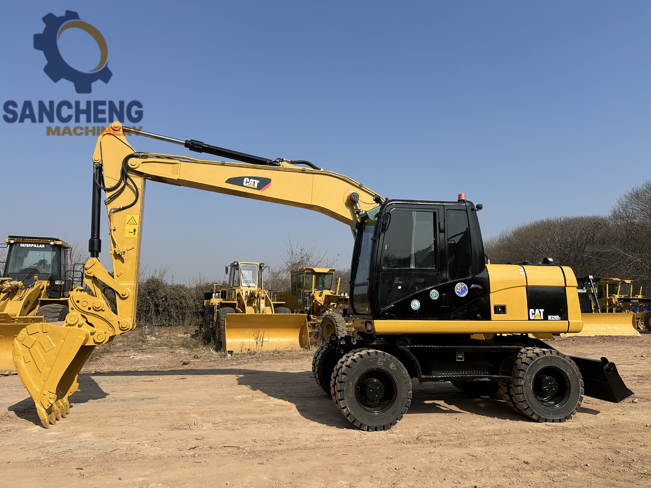 CATERPILLAR M320D2 - Bager na kotačima: slika CATERPILLAR M320D2 - Bager na kotačima CATERPILLAR M320D2 - Bager na kotačima: slika CATERPILLAR M320D2 - Bager na kotačima