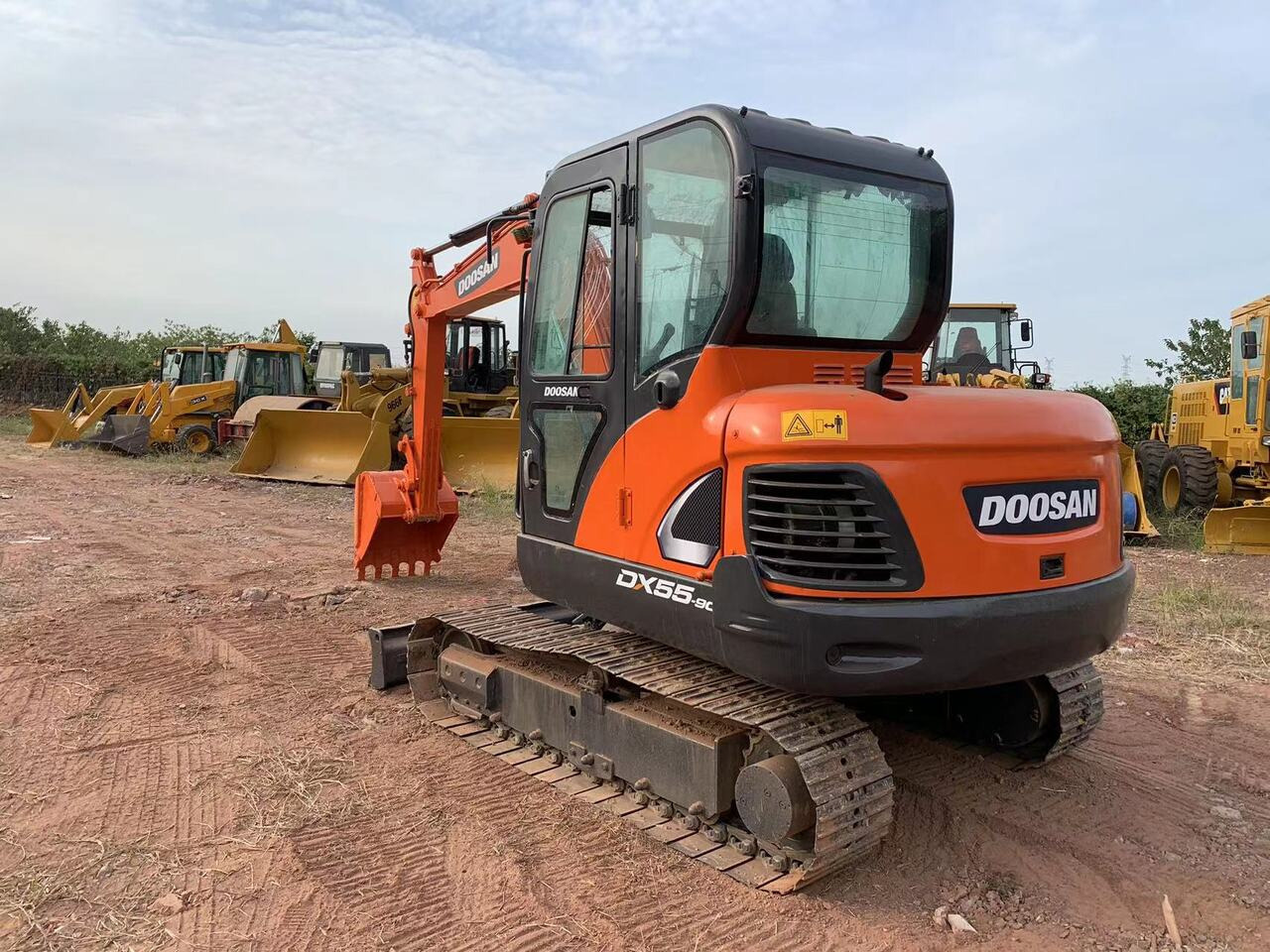 DOOSAN DX55 - Bager: slika DOOSAN DX55 - Bager DOOSAN DX55 - Bager: slika DOOSAN DX55 - Bager
