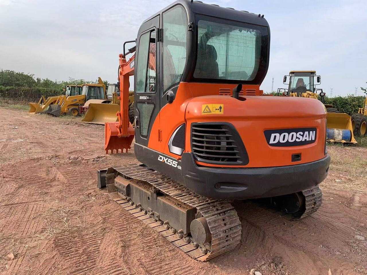 DOOSAN DX55 - Bager: slika DOOSAN DX55 - Bager DOOSAN DX55 - Bager: slika DOOSAN DX55 - Bager