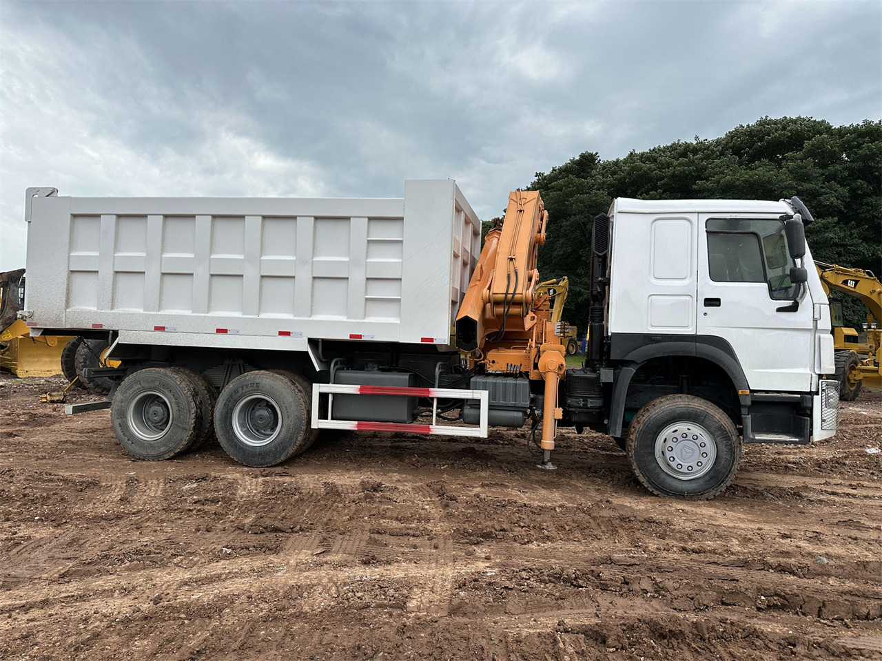 HOWO 371 Mounted Crane Dump truck - Kamion s kranom: slika HOWO 371 Mounted Crane Dump truck - Kamion s kranom HOWO 371 Mounted Crane Dump truck - Kamion s kranom: slika HOWO 371 Mounted Crane Dump truck - Kamion s kranom