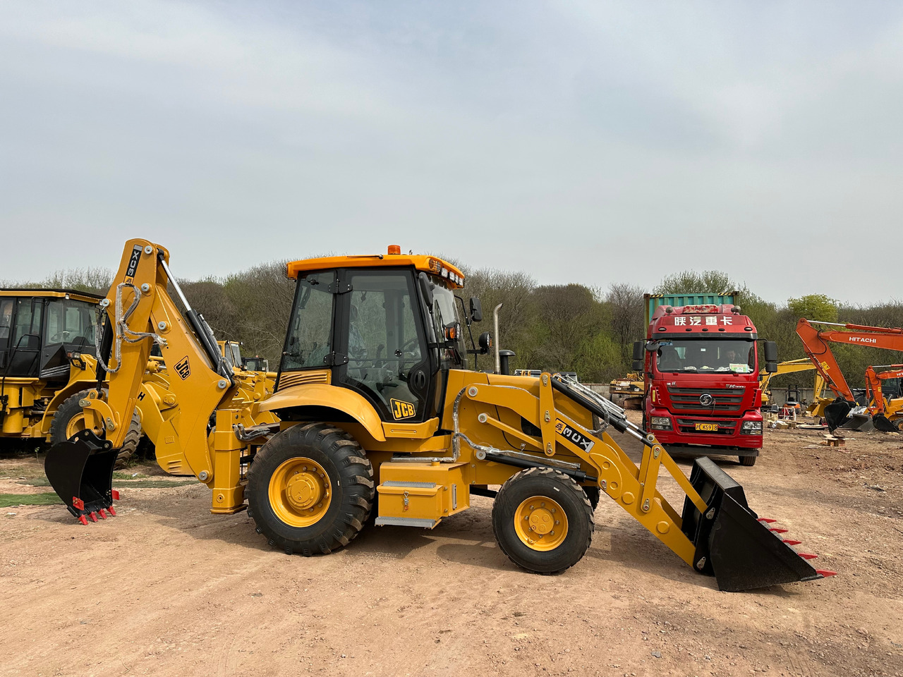 JCB 3CX - Rovokopač-utovarivač: slika JCB 3CX - Rovokopač-utovarivač JCB 3CX - Rovokopač-utovarivač: slika JCB 3CX - Rovokopač-utovarivač