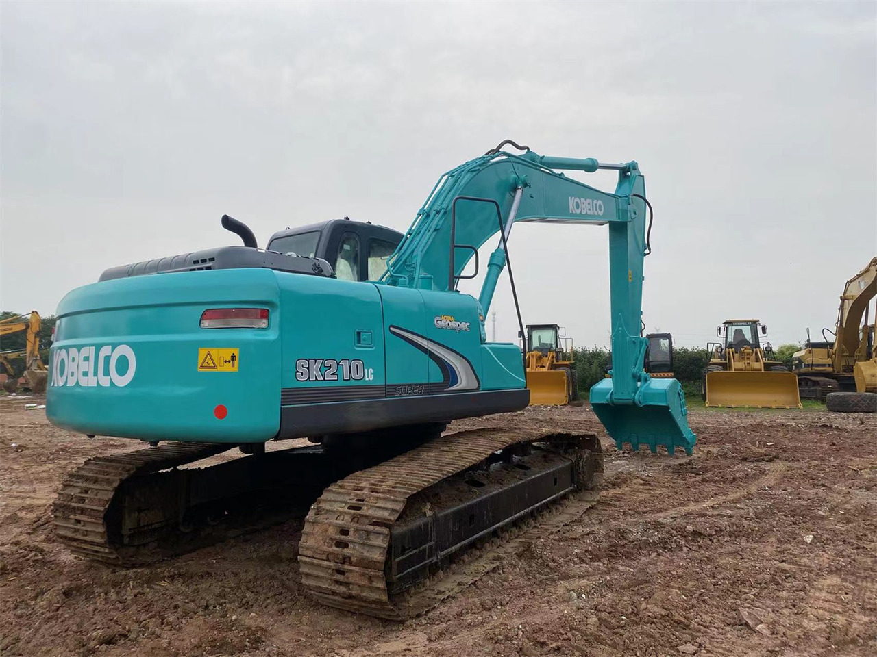 KOBELCO SK210LC-8 - Bager gusjeničar: slika KOBELCO SK210LC-8 - Bager gusjeničar KOBELCO SK210LC-8 - Bager gusjeničar: slika KOBELCO SK210LC-8 - Bager gusjeničar