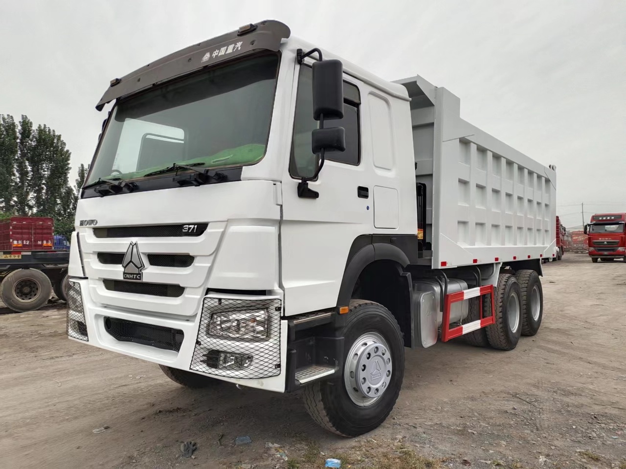 SINOTRUK HOWO Dump truck 371 6x4 - Kiper: slika SINOTRUK HOWO Dump truck 371 6x4 - Kiper SINOTRUK HOWO Dump truck 371 6x4 - Kiper: slika SINOTRUK HOWO Dump truck 371 6x4 - Kiper