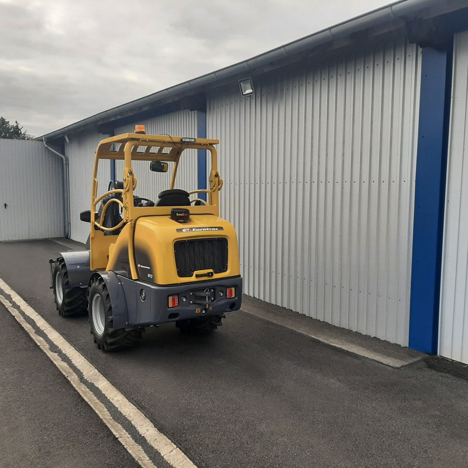 Eurotrac W12 Radlader Hoflader - Zglobni utovarivač: slika Eurotrac W12 Radlader Hoflader - Zglobni utovarivač Eurotrac W12 Radlader Hoflader - Zglobni utovarivač: slika Eurotrac W12 Radlader Hoflader - Zglobni utovarivač