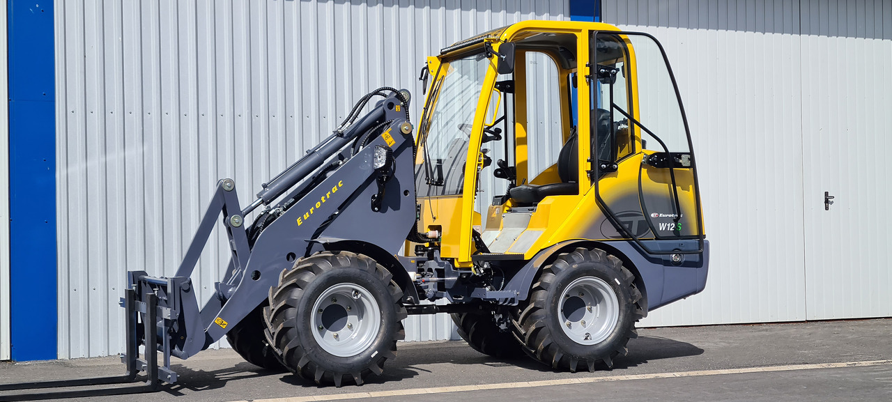 Eurotrac W12 Radlader Hoflader - Zglobni utovarivač: slika Eurotrac W12 Radlader Hoflader - Zglobni utovarivač Eurotrac W12 Radlader Hoflader - Zglobni utovarivač: slika Eurotrac W12 Radlader Hoflader - Zglobni utovarivač
